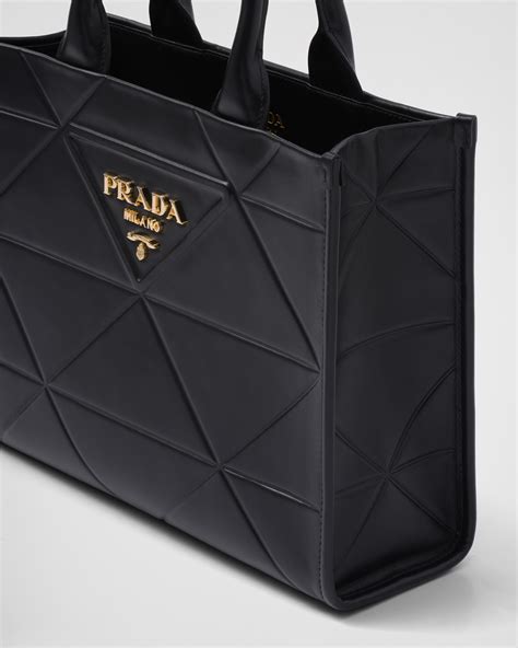 prada classic triangle logo in cream leather|prada symbole logo.